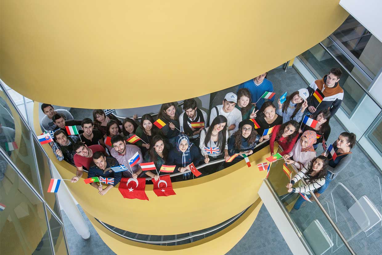 students with flags of different countries